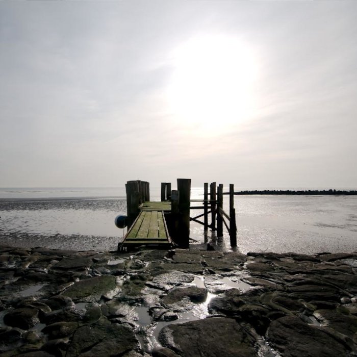 Foto Anlegesteg im Sonnenuntergang auf der Hallig Langeness